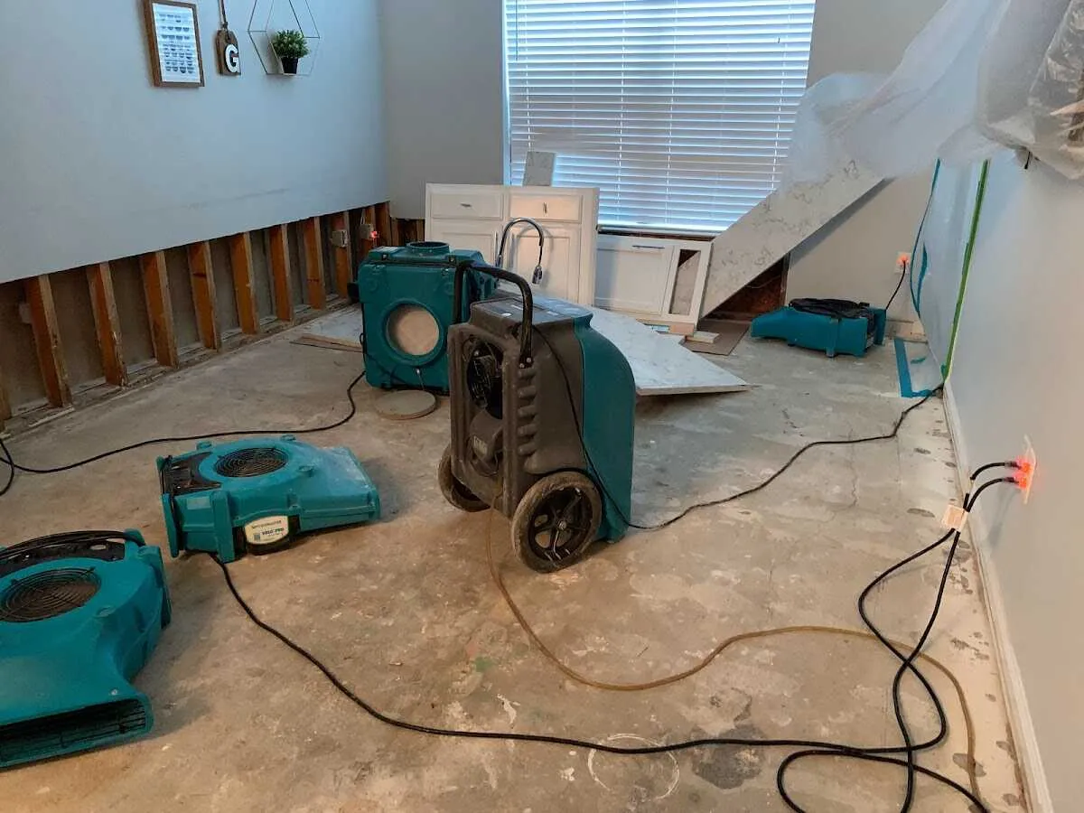 Dehumidifier in flood-cut room for Water Damage Restoration in Reno